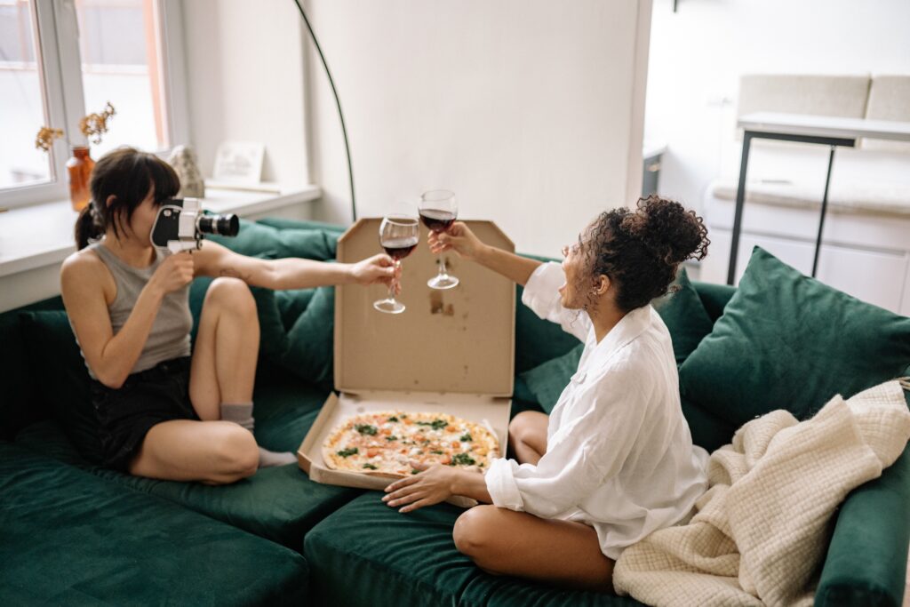 the image depicts girls having 3 day old pizza